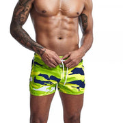 Hommes mode camouflage trois points shorts pantalons de plage sports shorts fendus hommes