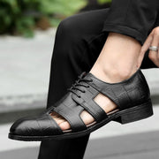 საზაფხულო მამაკაცის ჩვეულებრივი საქმიანი კოსტუმი ფეხსაცმელი ყავისფერი მამაკაცის სანდლები ტყავის კლასიკური მამაკაცის კაბა სუნთქვის ფეხსაცმელი