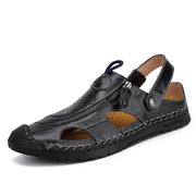 კლასიკური რბილი ნატურალური ტყავის მამაკაცის სანდლები კომფორტული ჩუსტი მამაკაცის საზაფხულო ფეხსაცმელი კომფორტული პლაჟის სანდლები გარე სნეიკერი საფენები