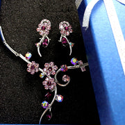Set di collana di orecchini di cristalli rotondi di rosa chiara